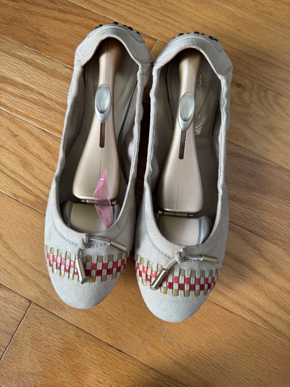 Tod’s Gommini Ballet Flats in beige suede.